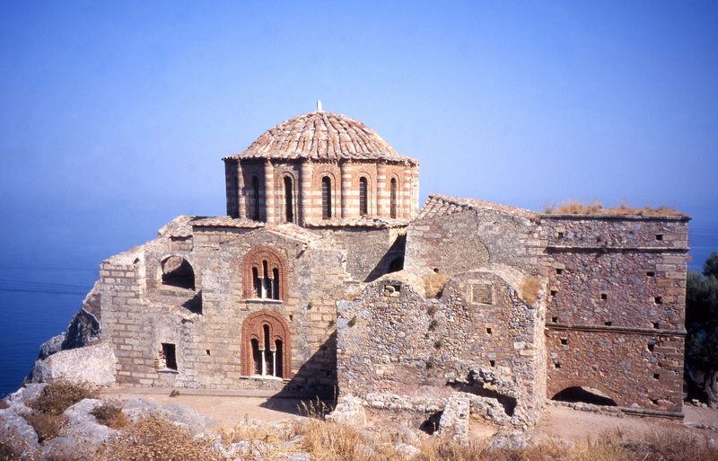 Illustration for article titled This Greek island is the perfect paradise—and supervillain hideout
